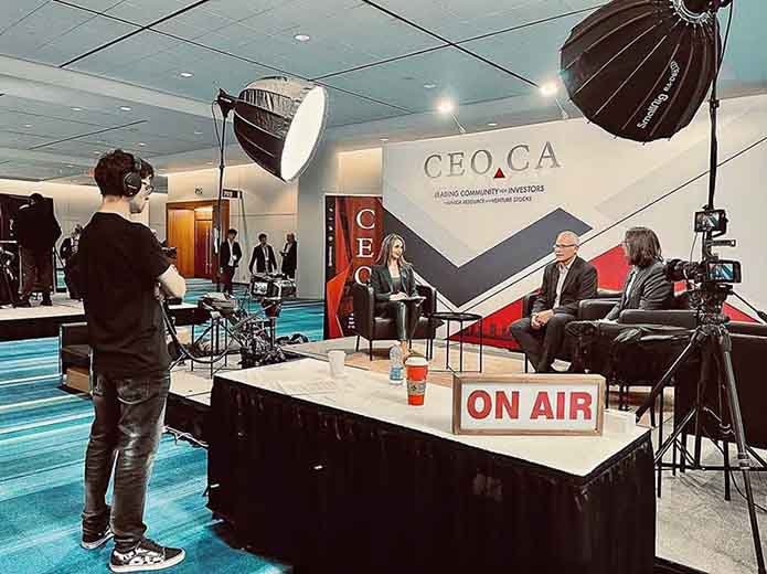 Compact K&F camera and lighting crew filming a business interview at a Toronto event