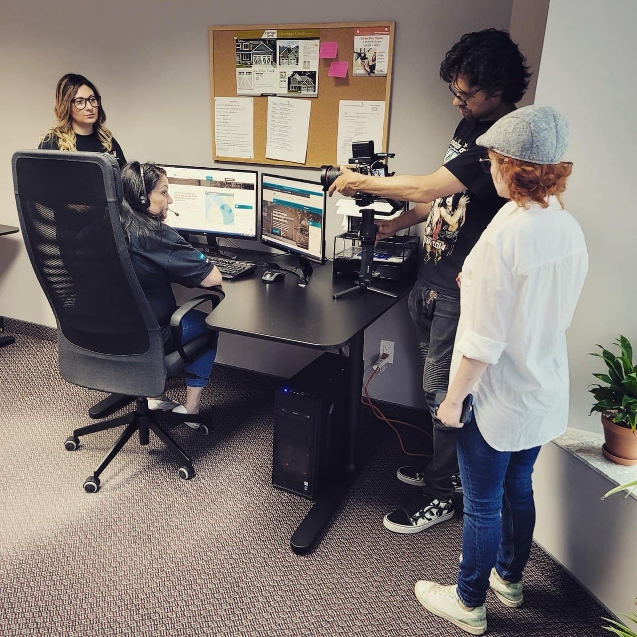 K&F Video Production filming corporate content in an active Toronto office